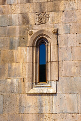 It's Window of the Monastery of Geghard, unique architectural construction in the Kotayk province of Armenia. UNESCO World Heritage