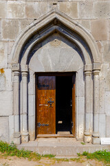 Fototapeta na wymiar It's Door of the Haghpatavank (Haghpat Monastery), a medieval Armenian monastery complex in Haghpat, Armenia. It's a UNESCO World Heritage site
