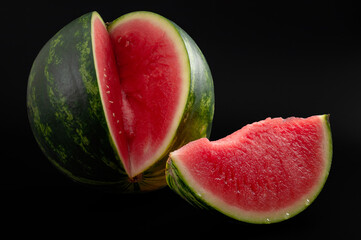 Fresh fruit dessert and delicious food concept with low key high contrast moody picture of seedless...