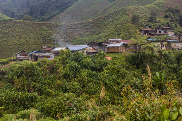 Fototapeta na wymiar View of a small village in the tea plantations in the Cameron Highlands, Malaysia