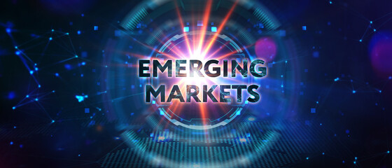 Business, Technology, Internet and network concept. Young businessman working on a virtual screen of the future and sees the inscription: Emerging markets