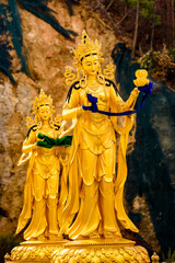 Obraz premium Golden statue around the Big Buddha statue in the Kingdom of Bhutan
