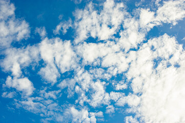 Naklejka na ściany i meble The blue sky and white clouds with beautiful patterns