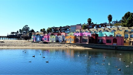 group of colorful houses along the river