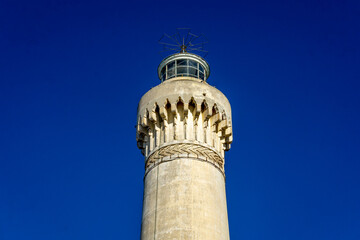 El Hank Lighthouse constructed in 1916, 50 m tall, abandoned facility.  - Casablanca, Morocco, taken in Dec 2019.