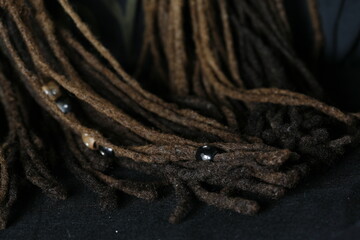 African American dreadlocks hairstyle background - selective focus