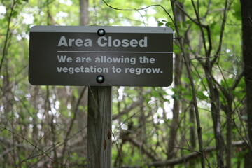 Area Closed Sign We Are Allowing The Vegetation To Regrow