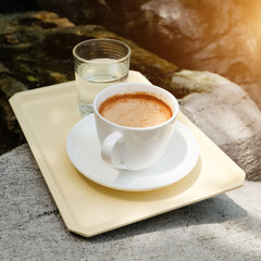 cup of coffee on the stone