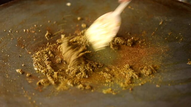 Making indian red gravy stuffing with peas for vada pav and bhaji.