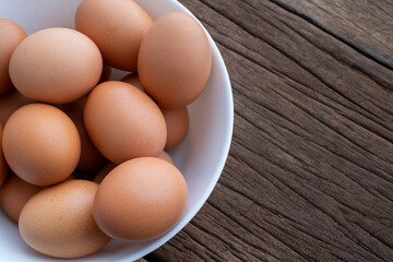Chicken Eggs on wooden background. easter