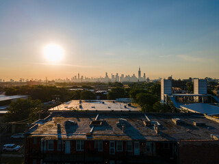 4k aerial drone footage of Chicago skyline during sunrise early morning with light fog rolling through the building architecture in the city. Gold hour in the metropolis is very beautiful  