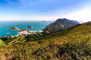 Fotobehang Pacific Ocean view from Hong Kong Mountains during the hiking on Dragons back hiking path near Shek O © Alexander Avsenev