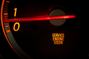 “SERVICE ENGINE SOON” light on dashboard of car in need of service or repair