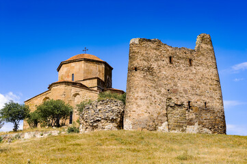Fototapeta na wymiar It's Jvari Monastery, Georgian Orthodox monastery of the 6th century on the mountain hill ove the old town of Mtskheta (UNESCO World Heritage site)
