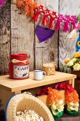 Corn, popcorn and straw hat. Typical table arrangements for the Brazilian Festa Junina - June Festival.