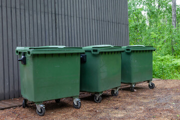 Plastic garbage containers on the street