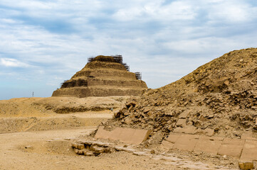 It's Pyramid of Djoser (Stepped pyramid), an archeological remain in the Saqqara necropolis, Egypt. UNESCO World Heritage