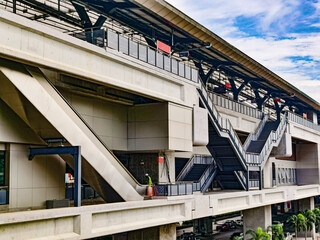 Architecture construction of elevator, escalator stairs and sky walk way, walk bridge between sky train station and department store mall