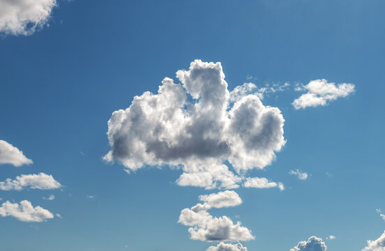 Blue sky with clouds.  Cloud-like a teddy bear, Pareidolia