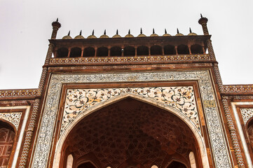 It's Gate for Taj Mahal (Crown of Palaces), an ivory-white marble mausoleum on the south bank of...