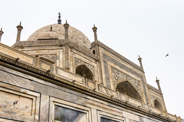 It's Taj Mahal (Crown of Palaces), an ivory-white marble mausoleum on the south bank of the Yamuna river in Agra.