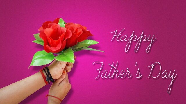 Little daughter giving flowers bouquet as gift on father's day with stylish happy father's day text