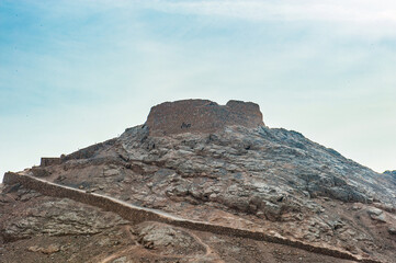 It's Tower of Silence, Iranian Zoroastrian tradition, the towers were built atop hills or low mountains