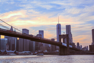 Fototapeta na wymiar Brooklyn Bridge and Manhattan Skyline at sunset