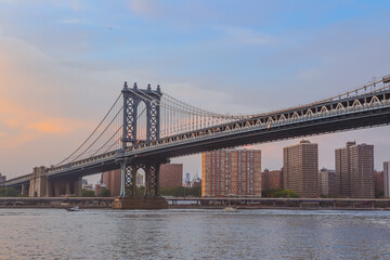 Manhattan Bridge and City Skyline at sunset