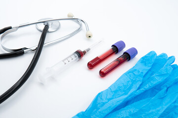 medical stethoscope and syringe