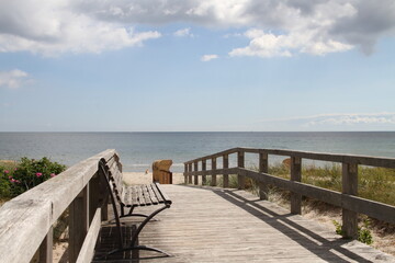 a wooden bridge as access to the beach on the Baltic Sea