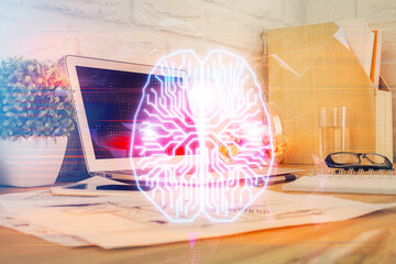 Double exposure of work space with computer and human brain drawing hologram. Brainstorm concept.