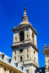 Fototapeta premium It's Bell tower of the Royal Seat of San Lorenzo de El Escorial, Spain. UNESCO world heritage