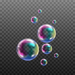 Transparent rainbow soap bubbles on checkered background.