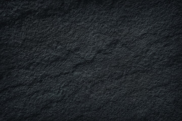 Dark grey black slate stone background or texture.
