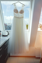 Beautiful wedding dress on a hanger