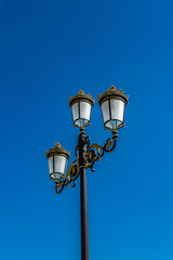 Fototapeta na wymiar It's Lamp post inAranjuez, Community of Madrid, Spain. UNESCO World Heritage