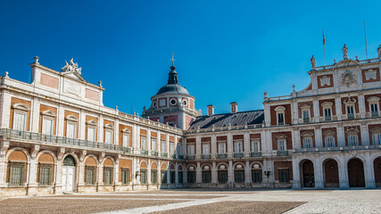Fototapeta premium It's Interior yard of the Royal Palace of Aranjuez, a residence of the King of Spain, Aranjuez, Community of Madrid, Spain. UNESCO World Heritage