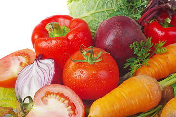 Colored vegetables. Tomatoes, cucumber, onions, peppers, carrots, beets, parsley on a white background