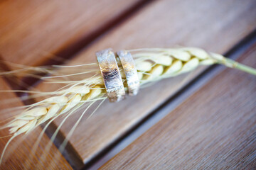 Two beautiful wedding rings on the barley
