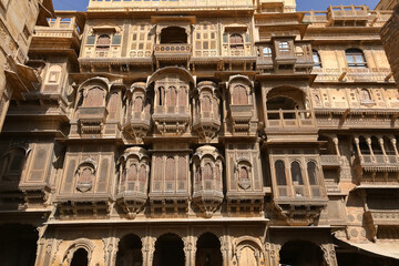 Rajasthan ancient heritage building known as the Patwon Ki Haveli built with yellow limestone with...