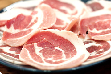 Sliced raw pork: close-up view