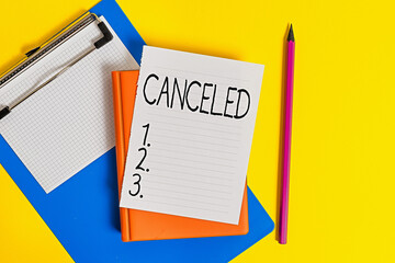 Handwriting text writing Canceled. Conceptual photo to decide not to conduct or perform something...
