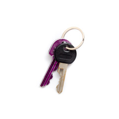 A purple and silver key lying on a white isolated