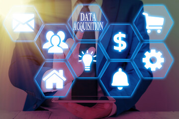 Writing note showing Data Acquisition. Business concept for way to obtain statistics that can be maneuvered digitally