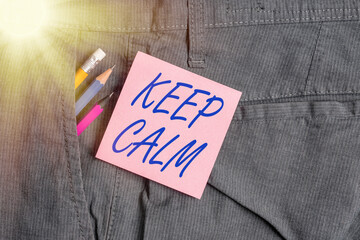 Conceptual hand writing showing Keep Calm. Concept meaning remain composure over situations with...