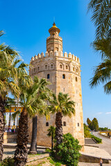 Fototapeta na wymiar It's Torre de Oro (Golden Tower), a dodecagonal military watchtower in Seville, Spain