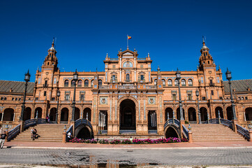Fototapeta na wymiar It's Central building main entrance at the Plaza de Espana in Seville, Andalusia, Spain. It's example of the Renaissance Revival style in Spanish architecture.