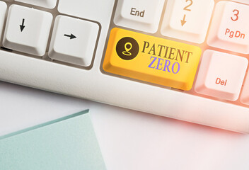 Word writing text Patient Zero. Business photo showcasing primary disease carrier of the highlycontagious disease White pc keyboard with empty note paper above white key copy space