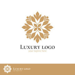 Golden flower logo. Elegant, classic vector.